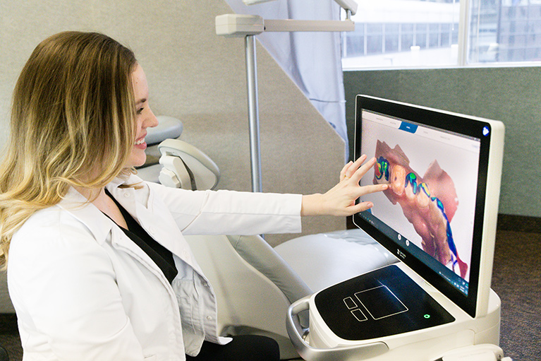 Dr. Thompson Reviewing Data from an Intra-Oral camera scan